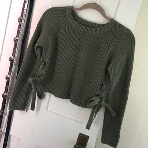 Army green cable-knit sweater with ties